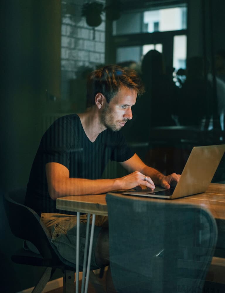 Man sitting in office, working late in his start-up company